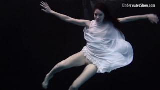Dark ambiance with a white dress seducer