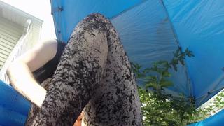 Trans girl explores muddy pleasures